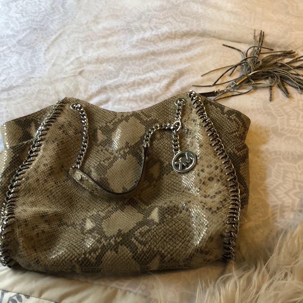 MK snake skin like color/texture.  Very unique